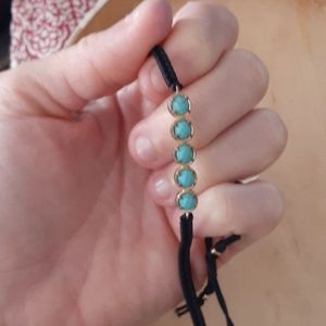 Adjustable blue and black bracelet